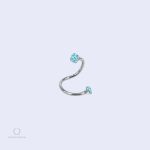 Piercing arcade ondulé en bleu, design Torsada Ciel