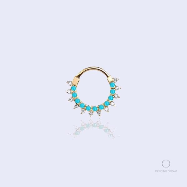 piercing-au-daith-pierres-bleues-1 Piercing Daith Gaiya avec pierres bleues décoratives