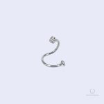 Piercing double labret décalé Torsada Zircon