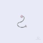 Piercing d'hélix en forme ondulée, décoré de strass rose