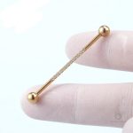 Celeste, piercing or pour un look audacieux