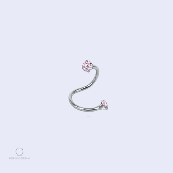 Piercing labret ondulé en gemme rose, design élégant et original