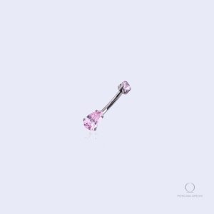 Piercing nombril avec pierres rose, style chic et tendance