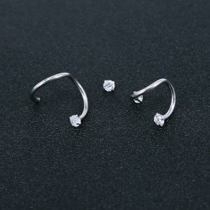 Piercing rook avec design torsadé et deux diamants